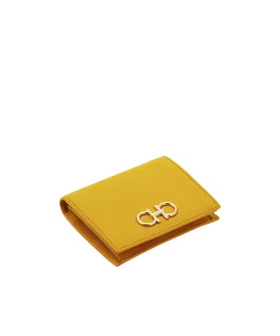 Ferragamo Gancini Compact Wallet In Yellow