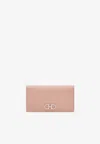 Ferragamo Gancini Continental Wallet In Hammered Leather In Pink