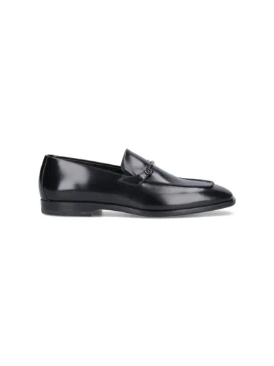 FERRAGAMO GANCINI LOAFERS IN BLACK LEATHER