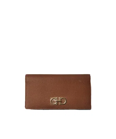 Ferragamo Gancini Long Wallet In Brown