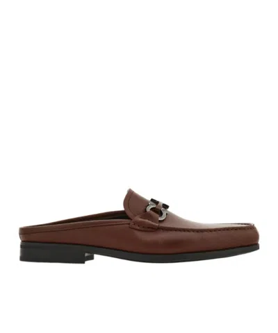 Ferragamo Gancini-ornament Mules In Brown
