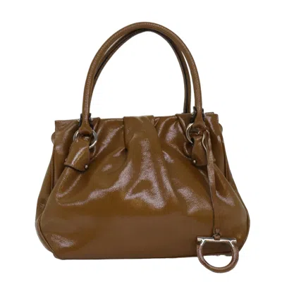 Pre-owned Ferragamo Gancini Patent Leather Handbag () In Brown