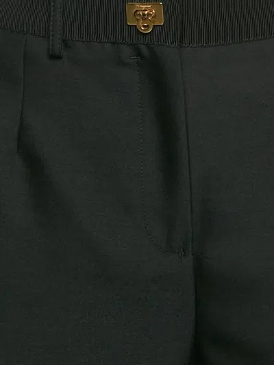 Pre-owned Ferragamo Gancini Plaque Trousers In Black