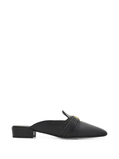 Ferragamo Gancini-ornament Mules In Black