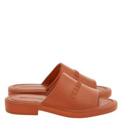 Ferragamo Giuneva Logo Embossed Slides In Brown