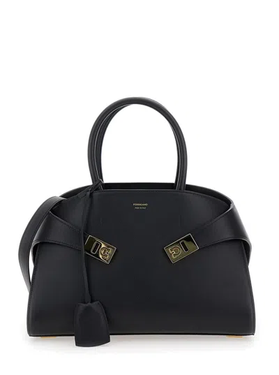 FERRAGAMO 'HUG' BLACK HANDBAG WITH LOGO AND GANCINI BUCKLE IN LEATHER WOMAN
