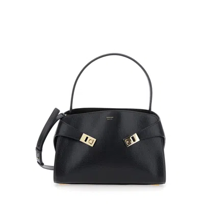 FERRAGAMO FERRAGAMO HUG BLACK SHOULDER BAG WITH LOGO PRINT ON THE FRONT IN LEATHER