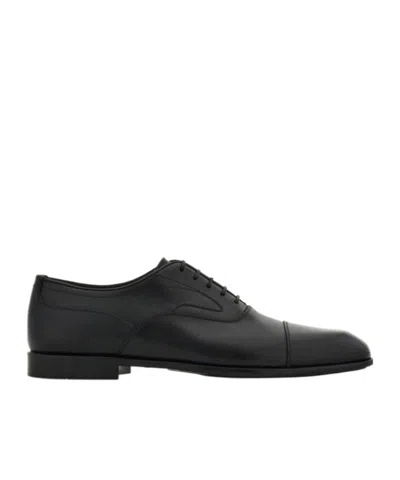 Ferragamo Lace-up Flat Shoes In Black