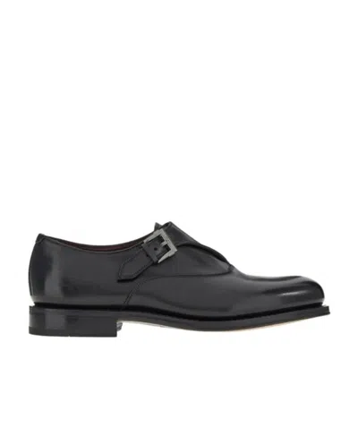 Ferragamo Leather Buckled Monkstrap Shoes In Black