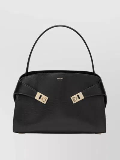 FERRAGAMO LEATHER HUG M HANDBAG WITH METAL ACCENTS