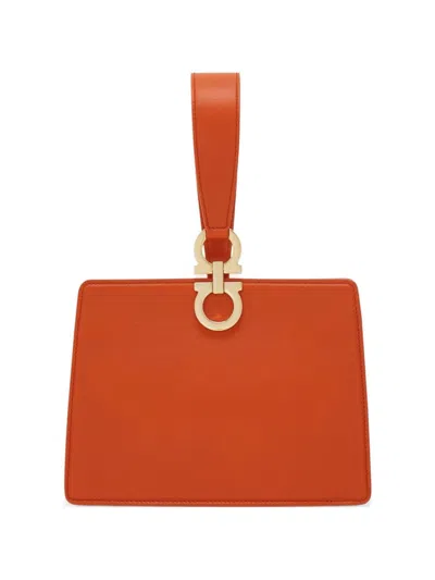 Ferragamo Leather Mini Clutch In Orange