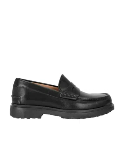 Ferragamo Logo Business Casual Shoes In Black