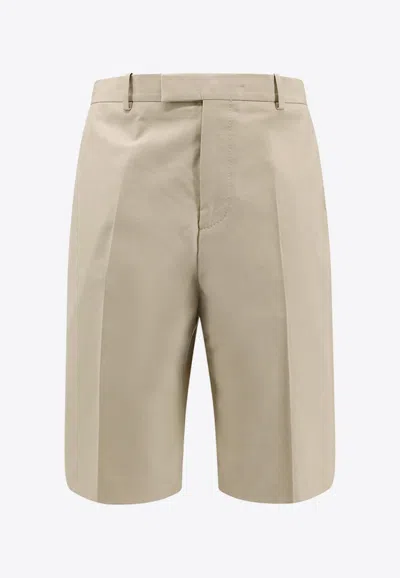 FERRAGAMO LOGO-EMBOSSED BERMUDA SHORTS