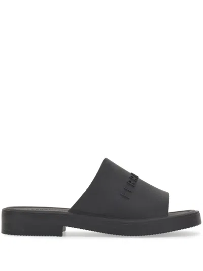 Ferragamo Giuneva Logo Embossed Slide Sandal In Black
