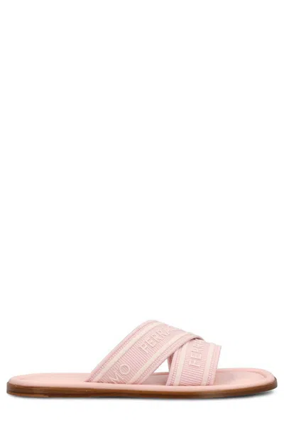 FERRAGAMO LOGO EMBOSSED SLIP-ON SANDALS