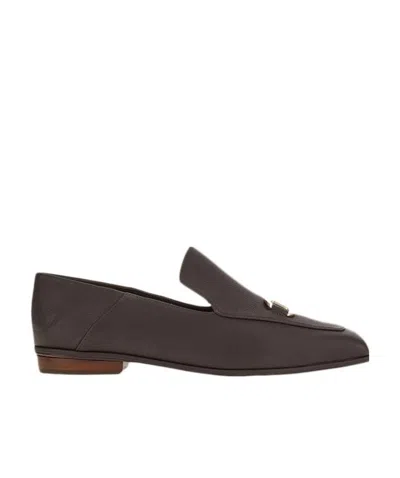 Ferragamo Logo Flats In Black