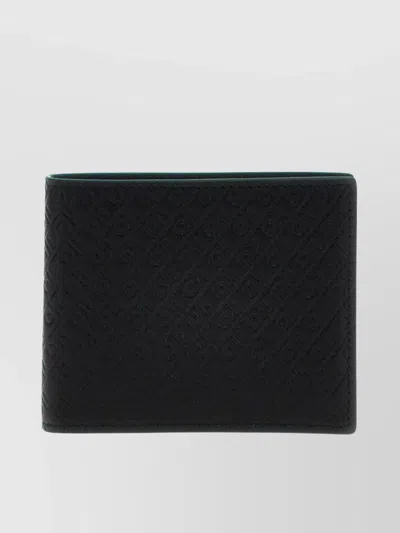Ferragamo Logo Patterned Bi-fold Wallet In Black