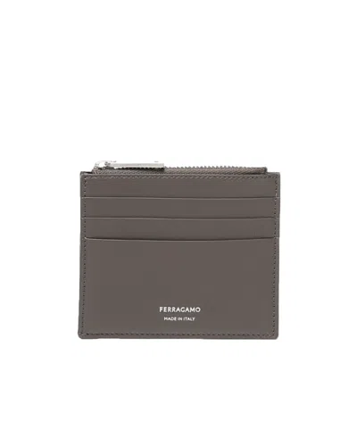 Ferragamo Logo Printed Zipped Cardholder In Brown