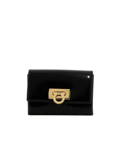 Ferragamo Glossy Finish Gold-tone Hardware Wallet In Black