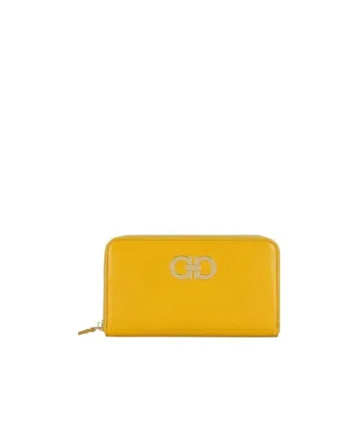 Ferragamo Logo Zipper Wallet In Yellow