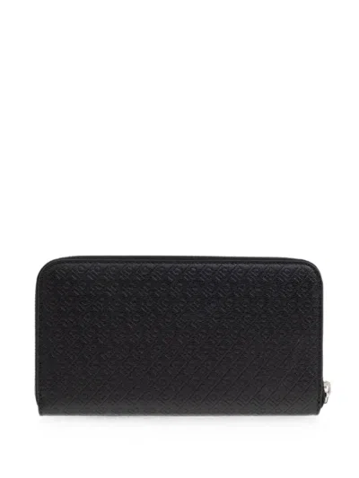 Ferragamo Logo-embossed Leather Wallet In Black