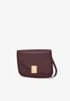 Ferragamo Medium Asymmetric Leather Shoulder Bag In Bordeaux