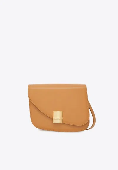 Ferragamo Medium Asymmetric Leather Crossbody Bag In Camel