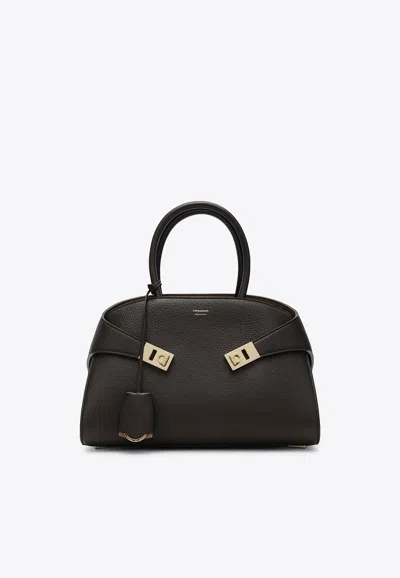 Ferragamo Medium Hug Leather Top Handle Bag In Black