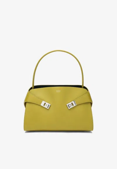 Ferragamo Medium Hug Leather Top Handle Bag In Yellow
