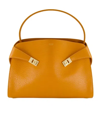 Ferragamo Medium Hug Maxi-grain Leather Shoulder Bag In Orange