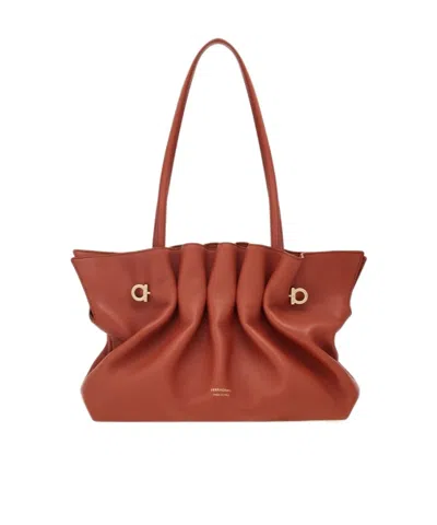 Ferragamo Medium Piercing Shoulder Bag (m) In Brick