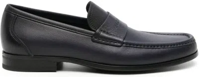 FERRAGAMO MEN'S LOGO DEBOSSED LEATHER LOAFERS