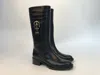 Ferragamo Metal Buckle Boots In Black