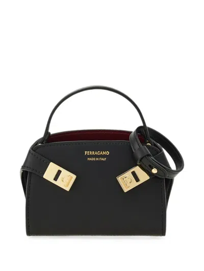 Ferragamo Mini Hug Top Handle Bag Charm In Black