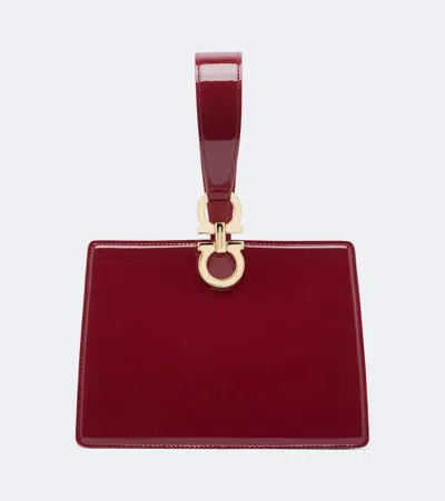 Ferragamo Mini Patent Leather Clutch In Burgundy