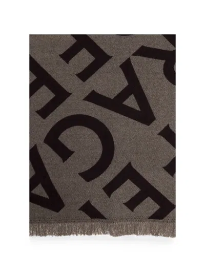 Ferragamo Monogram-print Fringed-edge Scarf In Brown