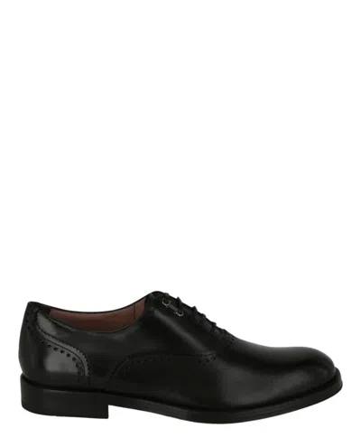 Ferragamo Penta Leather Oxfords In Black