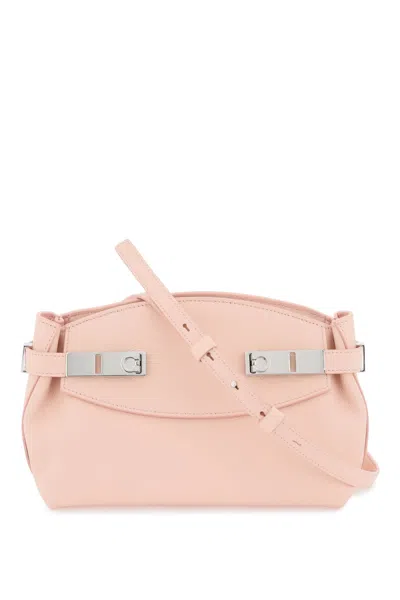 Ferragamo Pink Grained Leather Pouch Handbag With Adjustable Strap And Iconic Gancini Buckle In Gold