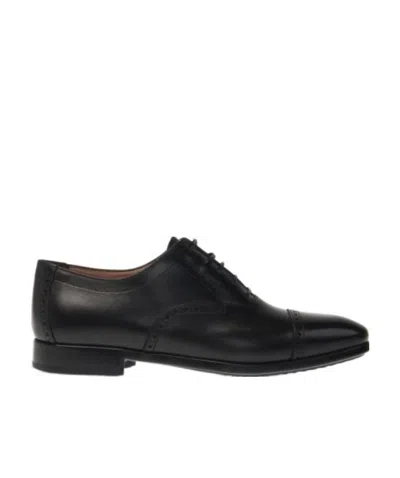 Ferragamo Riley Leather Brogues In Black
