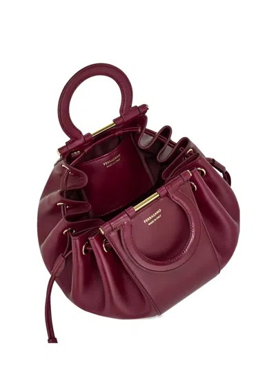 Ferragamo Round Handle Satchel In Burgundy