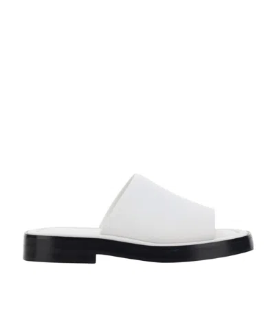 Ferragamo Round Head Flat Slippers In White