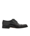 Ferragamo Round-headed Oxfords In Black