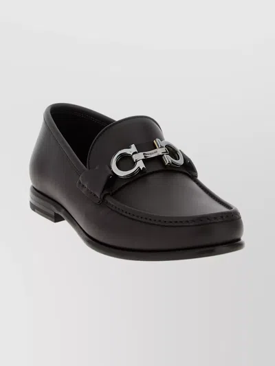 FERRAGAMO ROUND TOE LOAFERS FEATURING METALLIC BUCKLE