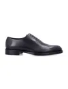 Ferragamo Almond Toe Brogues With Double Leather Sole In Black