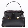 Ferragamo Hug Shearling-trimmed Leather Shoulder Bag In Black