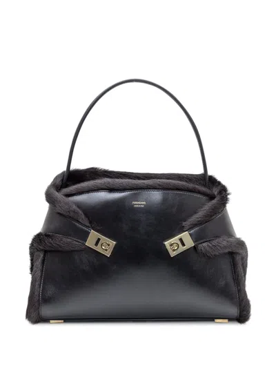 FERRAGAMO SALVATORE FERRAGAMO FERRAGAMO HUG BAG IN BLACK LEATHER AND FUR