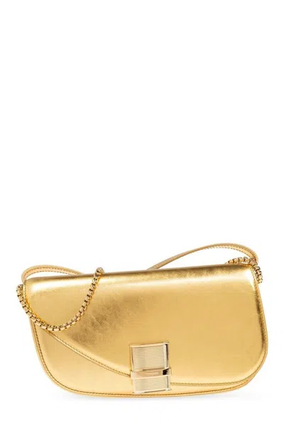 Ferragamo Flip Saddle Bag In Gold