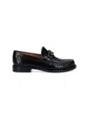 Ferragamo Gancini Plaque 35mm Leather Loafers In Black