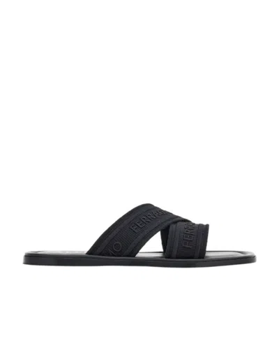 FERRAGAMO SALVATORE FERRAGAMO LOGO EMBOSSED SLIP-ON SANDALS