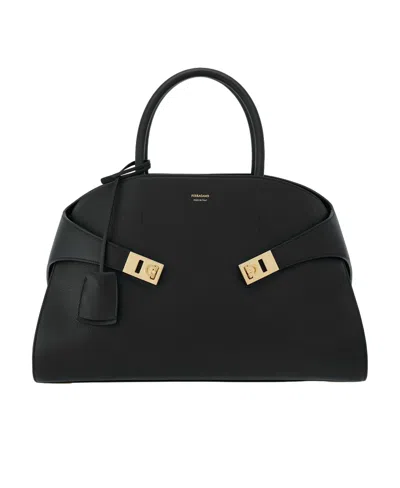 FERRAGAMO SALVATORE FERRAGAMO LOGO PRINTED SNAP-FIT CLOSURE TOTE BAG